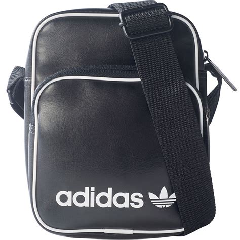 umhängetasche adidas schwarz gold|Schwarze Umhängetaschen .